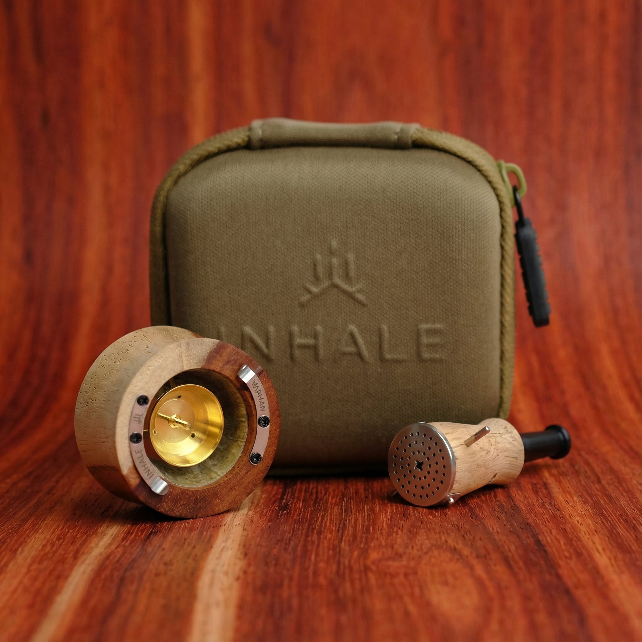 Limited edition Vapman Click vaporizer crafted from two-tone padauk wood, featuring a unique dual wood design and compact structure for precise manual herb use